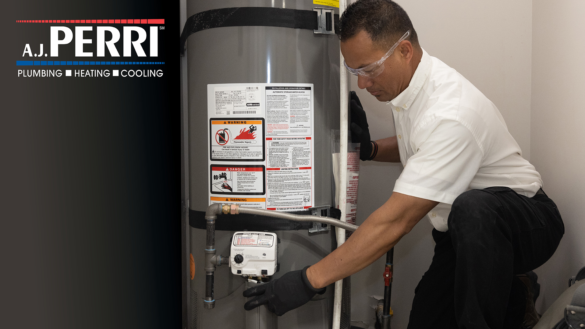 an AJ Perri technician changing the temperature of a water heater