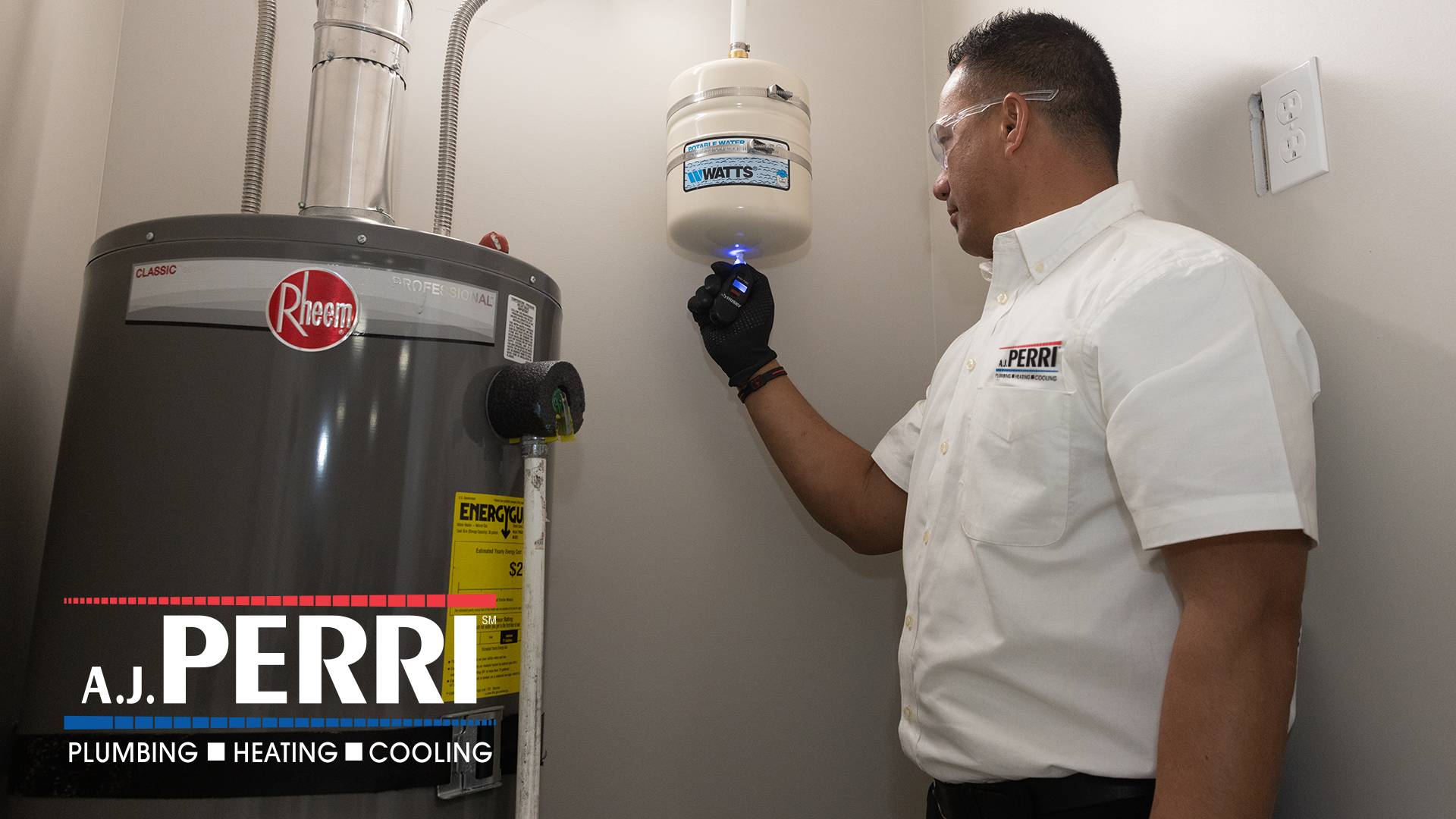 AJ Perri technician working on water heater