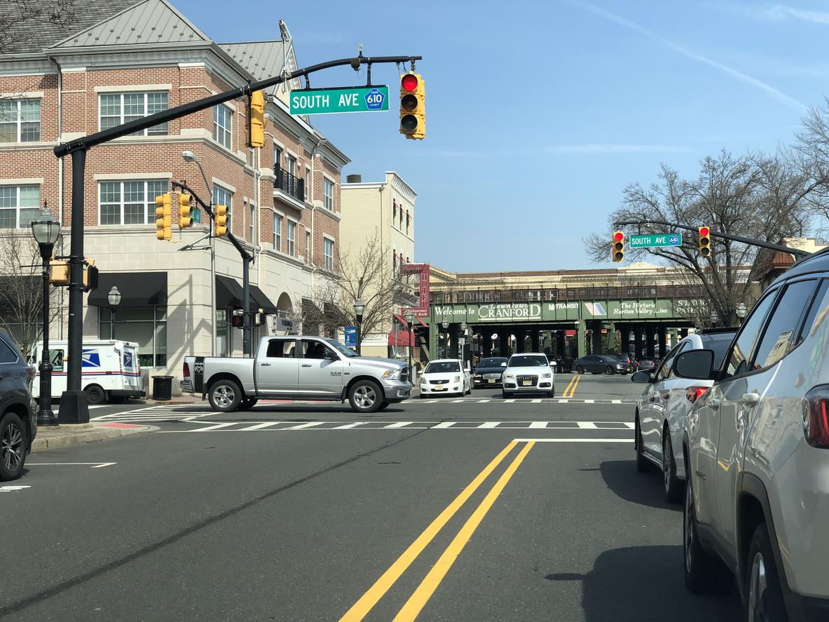 Cranford, NJ / USA - Walnut and South Ave crossing facing the train overpass by the Cranford Hotel.